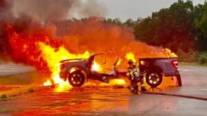 Ford F-150 is struck by lightning and catches fire during storm in the USA